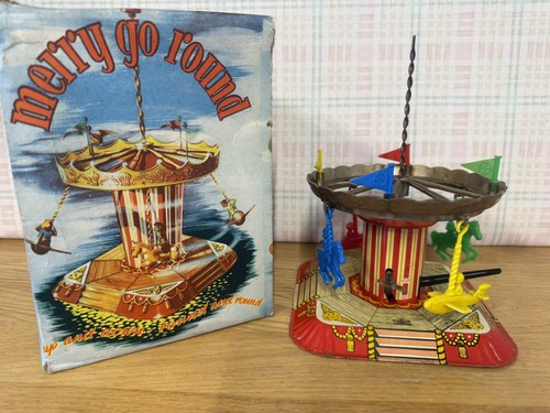 Vintage windup rotating merry - rotating,